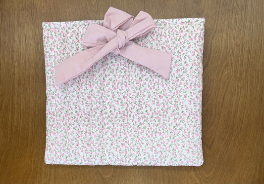 Pink floral quilted bag with pink bow