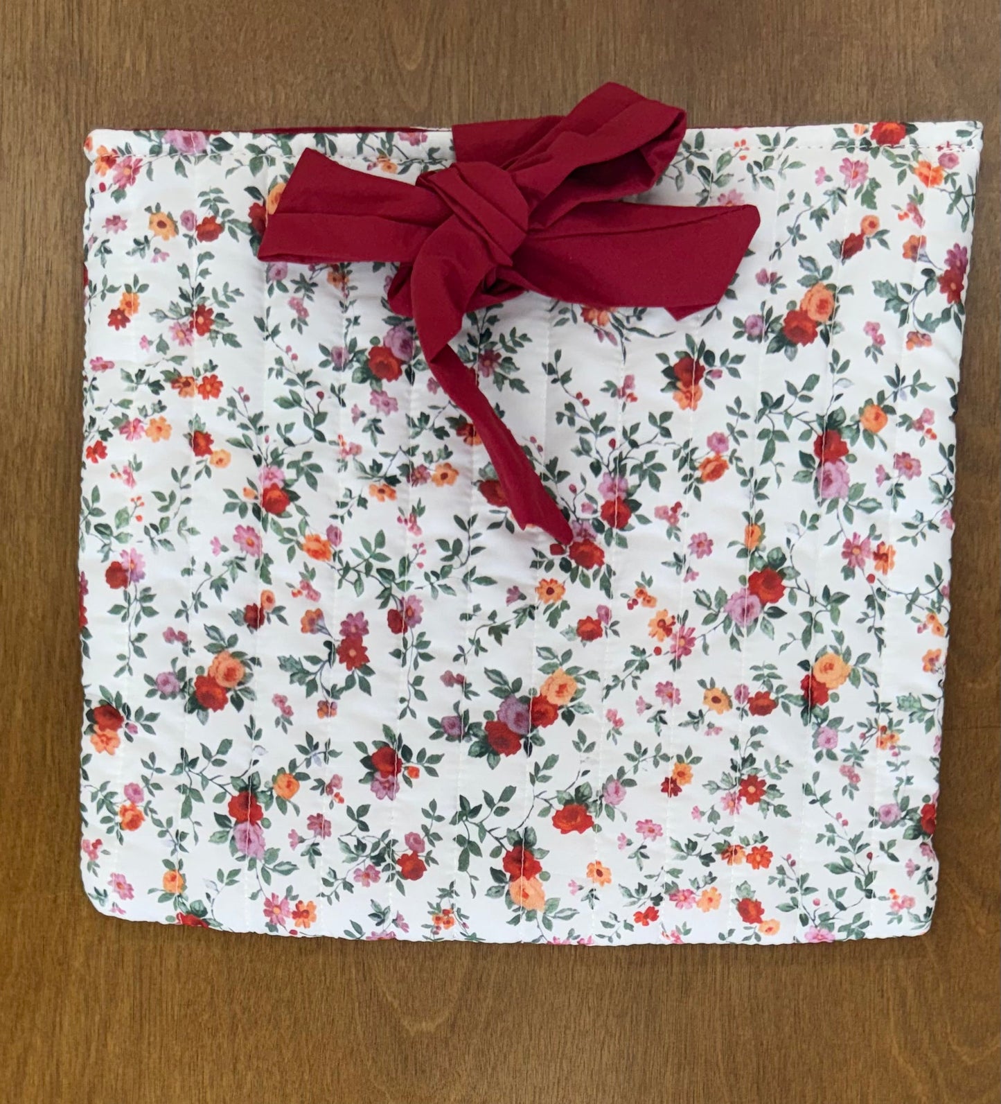 Red floral quilted bag with red bow