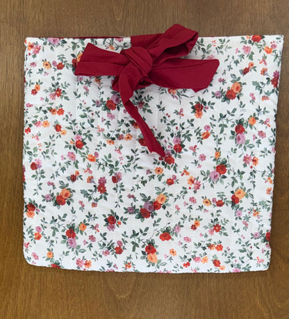 Red floral quilted bag with red bow