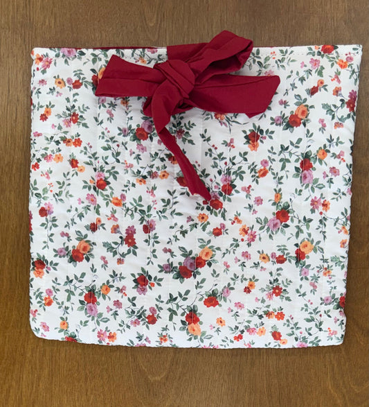 Red floral quilted bag with red bow